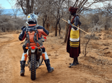 Adventure motorcycle tour in Tanzania a rider with a masai-2